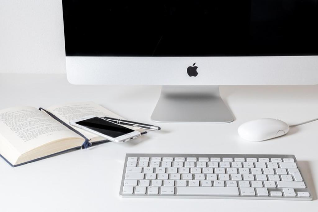 Minimalist workspace with Apple products